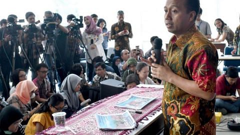 Dying of cancer, but Indonesia's disaster spokesman battles to tell world about quake-tsunami