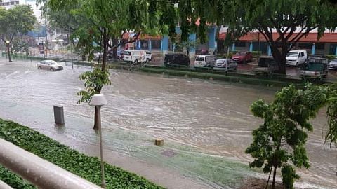 Flash floods hit parts of Singapore, including KPE, due to heavy downpour