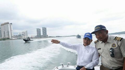 Five Malaysian government vessels in Singapore waters on Wednesday