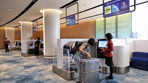 Jewel Changi Airport opens its doors; first few travellers at early check-in counters