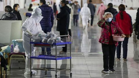 China reports fewer coronavirus cases outside epicentre, cases surge in South Korea