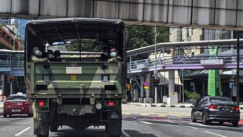 Coronavirus: Malaysian soldiers on streets to assist cops in enforcing movement curbs