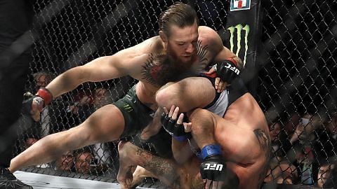 McGregor kembali beraja PERLAWANAN SENI MEMPERTAHANKAN DIRI CAMPURAN (MMA)