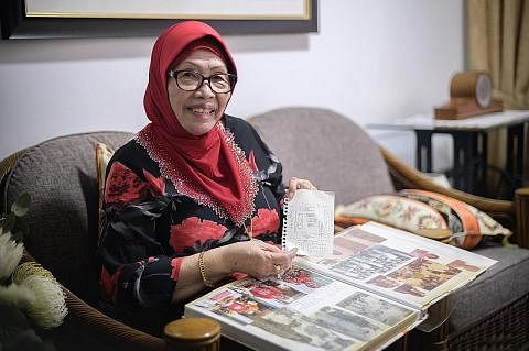 ZAMAN PAHIT: Cik Kamariah Mohd Naib menunjukkan peta yang menggambarkan kampung yang diduduki keluarganya di perkuburan Kristian Bidadari hingga 1945, semasa Singapura diperintah Jepun. - Foto BH oleh HARITH MUSTAFFA TEMPUH ZAMAN PERANG TANPA AYAH: K