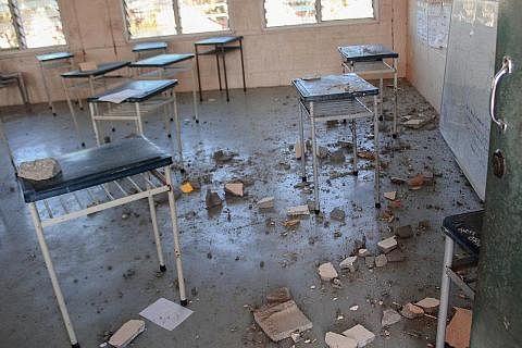 KESAN GEMPA: Kerosakan di Sekolah Menengah Kebangsaan Wawin berhampiran bandar Lae berikutan gempa bumi yang melanda Papua New Guinea. - Foto AFP