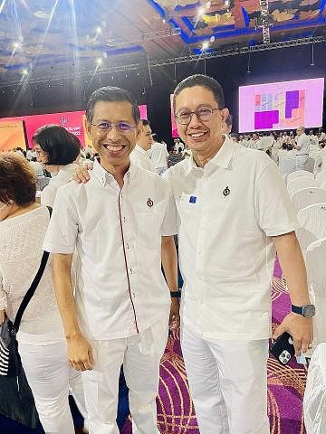 TURUT HADIR: Dr Abdul Razakjr Omar (kanan) dan Encik Shahrin Abdol Salam antara anggota Melayu/Islam yang hadir di Persidangan PAP.