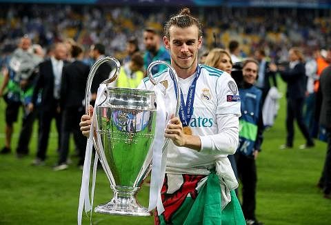 KERJAYA MENAKJUBKAN: Gareth Bale merai kejayaannya memenangi Liga Juara-Juara bersama Real Madrid, yang mengalahkan Liverpool pada final 2018. Pemain antarabangsa Wales ini menjuarai pertandingan itu lima kali bersama Real. - FOTO REUTERS
