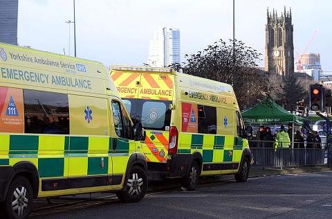 MOGOK: Pekerja ambulans berdiri di barisan piket dalam mogok di di Leeds, utara England. Kini, guru pula dijangka melancarkan mogok bulan depan untuk menuntut kenaikan gaji. - Foto AFP