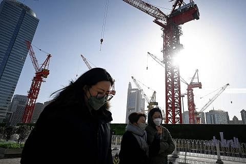 LEMAH: Pertumbuhan ekonomi China tahun lalu merosot ke antara paras terburuk dalam hampir setengah abad. - Foto AFP
