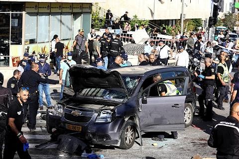 KEGANASAN MENINGKAT: Polis Israel berkata siasatan awalnya menunjukkan rempuhan kereta itu adalah serangan yang disengajakan. Beberapa jam sebelum itu, tentera Israel membunuh seorang warga Palestin semasa satu serbuan di Tebing Barat. - Foto REUTERS