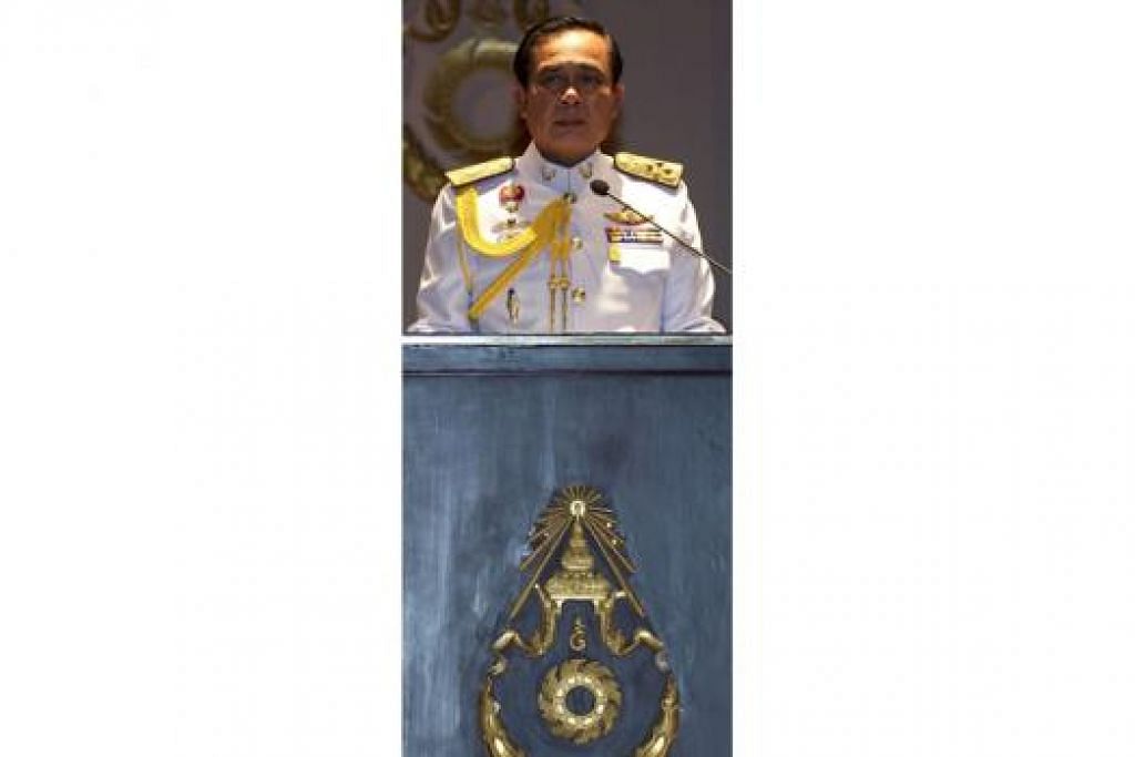 DIPERKENANKAN: Jeneral Prayuth mengumumkan semalam Raja Thailand sudah secara rasmi memperkenankan beliau mentadbir negara itu selepas pihak tentera merampas kuasa minggu lalu. - Foto AFP