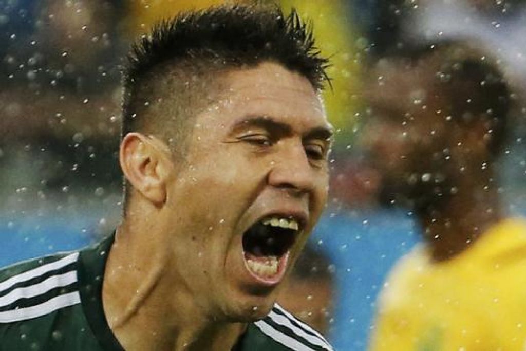 GIRANG: Pemain Mexico, Oribe Peralta meraikan gol semasa menentang Cameroon di Arena
Dunas di Natal. – Foto REUTERS