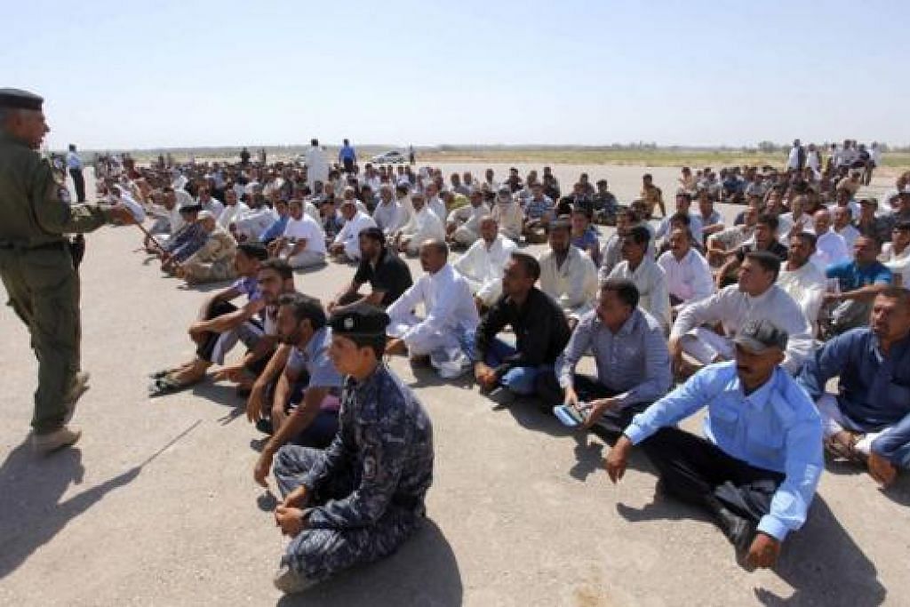 SERTAI PERTEMPURAN: Relawan yang menyertai pasukan keselamatan Iraq untuk menentang militan ISIL. - Foto-foto REUTERS 