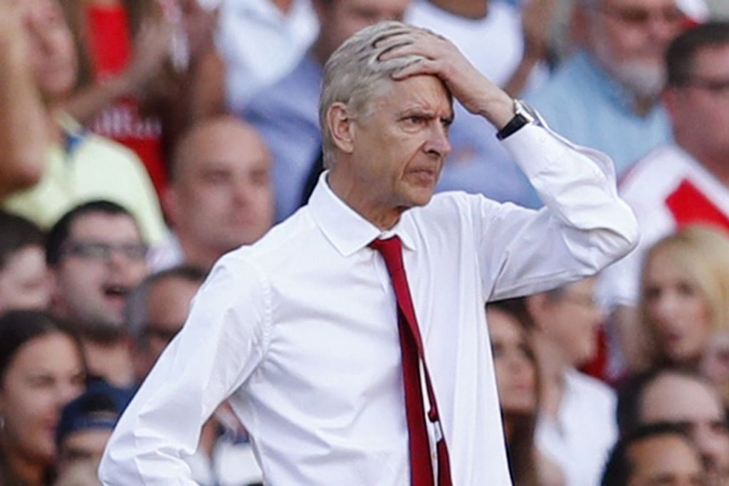 APA SILAPNYA?: Pengurus Arsenal, Arsene Wenger, pening melihat pasukannya tewas dalam perlawanan pembukaan musim ini kepada Liverpool pada 14 Ogos lalu. - Foto REUTERS