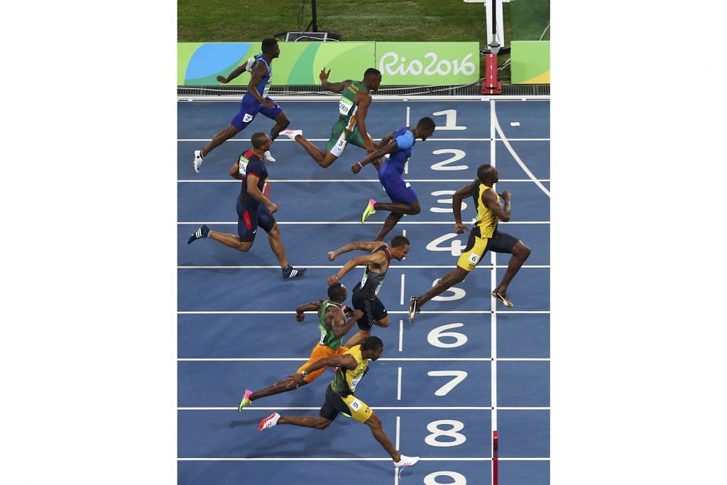 OLAHRAGA Usain Bolt buru emas 200m, 4x100m