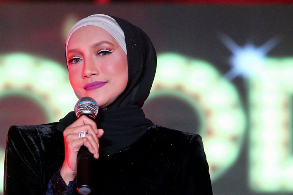 Ziana Zain, singer from Malaysia, divorced from her husband.