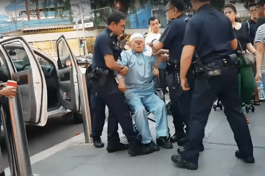 'Parrot Man' Zeng Guoyuan arrested for disorderly behaviour in Orchard Road
