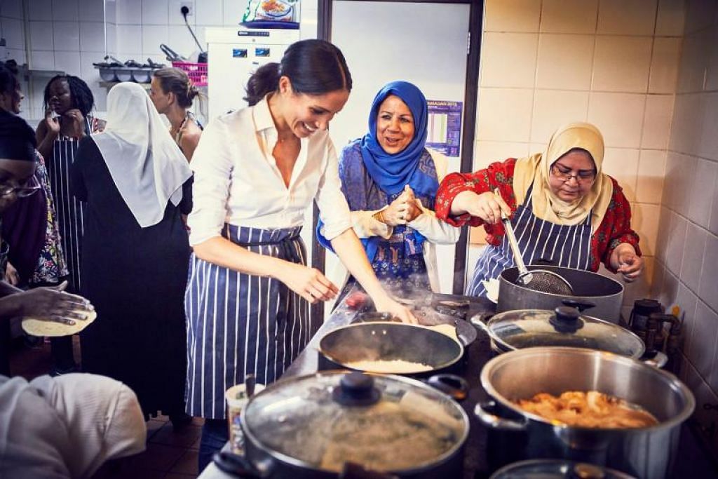 Britain’s Meghan launches Grenfell cookbook