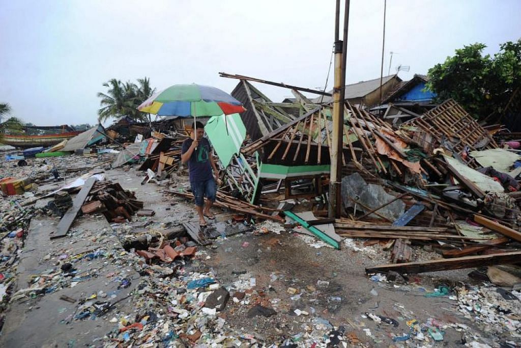 Indonesian tsunami: Torrential rains pound villages, hampering aid efforts in coastal areas around Sunda Strait