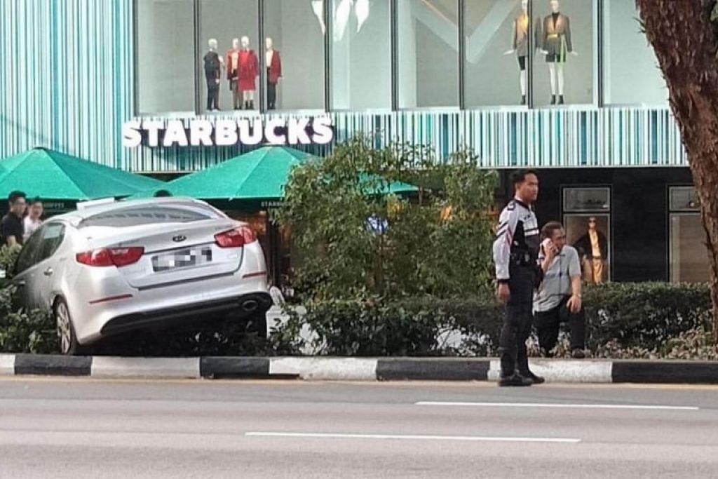 Taxi mounts Orchard Road pavement in early morning accident