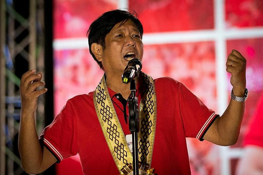 PESAING: Encik Ferdinand Marcos Jr dan Cik Leni Robredo dijangka bersaing hebat untuk memenangi jawatan presiden Filipina. TUNGGU GILIRAN MENGUNDI: Rakyat Filipina menunggu giliran mereka untuk membuang undi di Tondo di Metro Manila semalam dalam pil