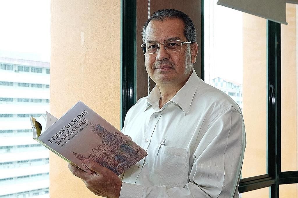 HARAP LEGASI BERKEKALAN: Encik Gamal Angullia berharap buku 'Indian Muslims in Singapore: History, Heritage and Contributions' mendorong anak-anaknya dan keluarga Angullia lain mencontohi cici-ciri seperti bekerja keras serta bijak melabur dan bernia