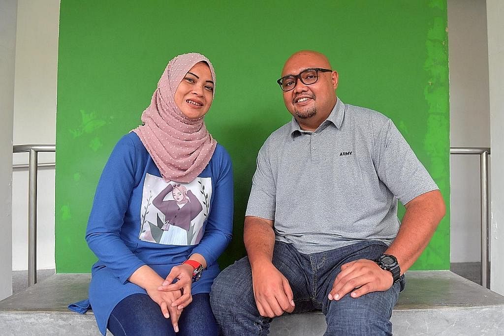 BERIKAN TERBAIK: Encik Mohammad Zaid dan Cik Siti Mariam akan gunakan elaun penjagaan $1,100 sebaik mungkin untuk memberikan yang terbaik untuk dua anak titipan mereka.